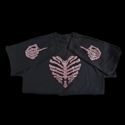 Heart shaped skeleton with middle fingers